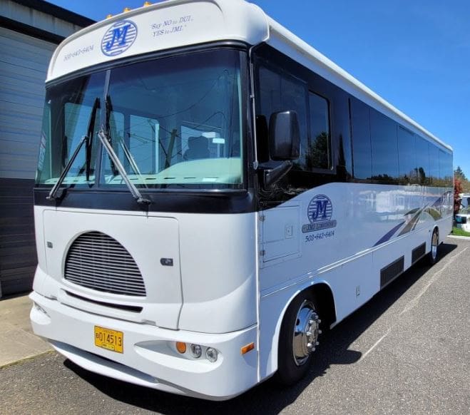 Charter Bus Portland Oregon - White Charter Bus JMI Limousine Charter Bus Portland Oregon - White Charter Bus JMI Limousine