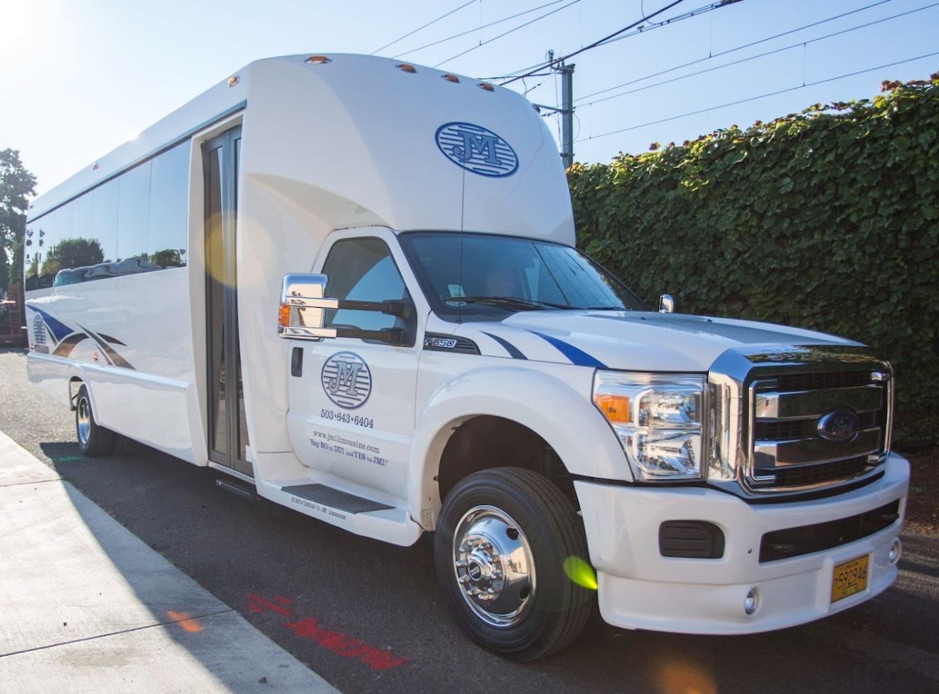 Deluxe Limo Bus Portland - JMI Limousine